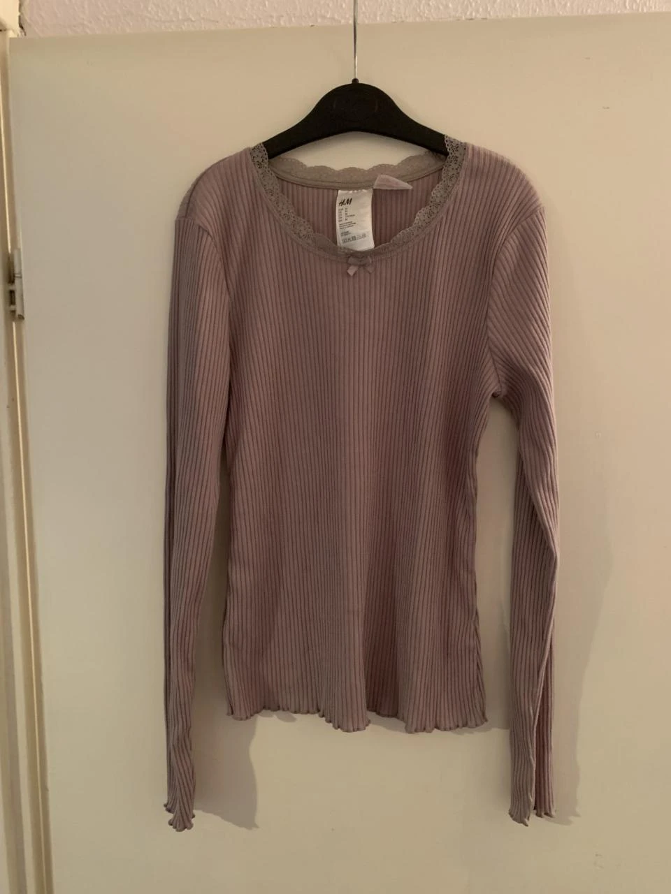 Lila shirt van de H&M. Maat M.